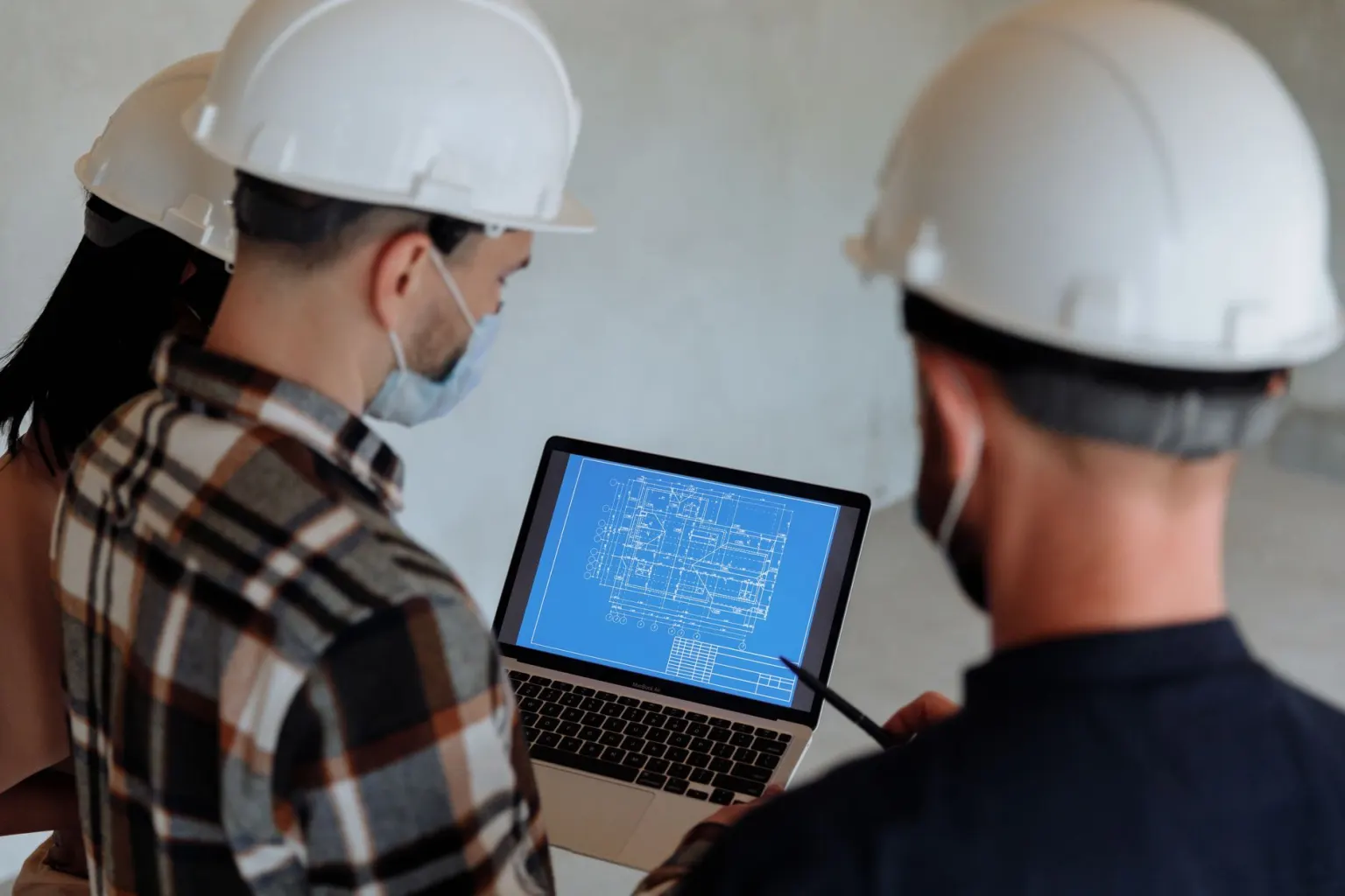 Trades team planning multi-trade property work