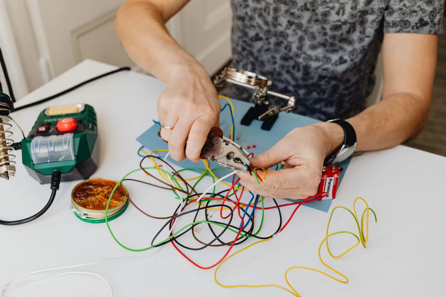 Electrician preparing cables during electrical work